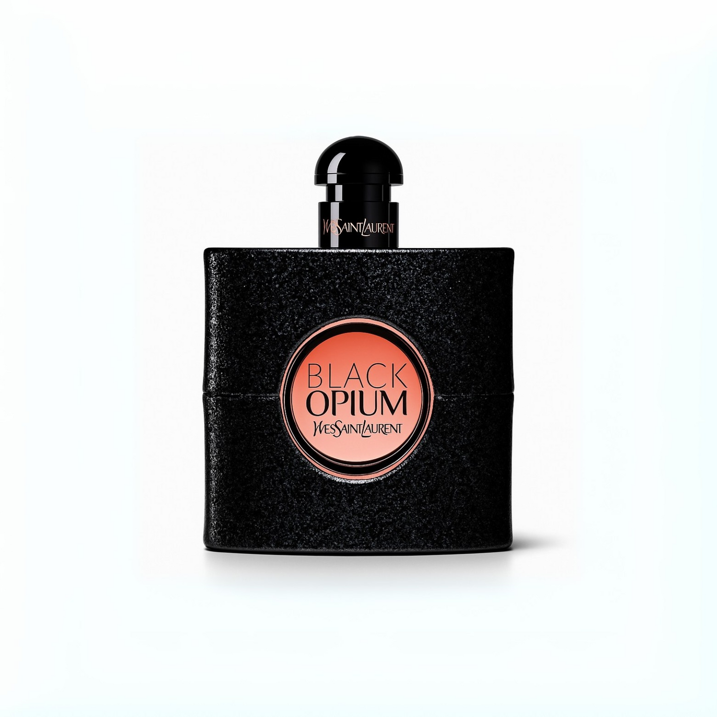 Yves Saint Laurent Black Opium Eau de Parfum black glitter bottle with pink center label on a plain white background