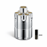 Azzaro Wanted Eau de Parfum silver and gold revolver-inspired bottle on white background