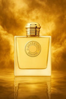 Burberry Goddess Eau de Parfum bottle in a golden, radiant background
