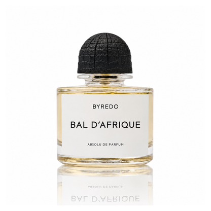Byredo Bal d'Afrique Absolu de Parfum unisex fragrance bottle with golden amber liquid, white minimalist label and textured black cap on a white background