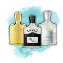 Creed Millesime Imperial, Aventus, and Virgin Island Water perfume bottles on a vibrant aqua splash backdrop