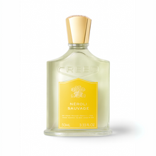 Creed Neroli Sauvage perfume bottle with gold cap and yellow label on white background