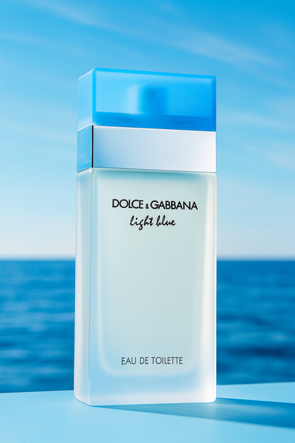 Dolce & Gabbana Light Blue Eau de Toilette bottle with blue cap displayed against a bright ocean background under sunlight