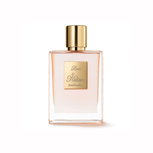 Kilian Love Don't Be Shy Eau de Parfum bottle on a white background, highlighting the sleek glass design and gold detailing