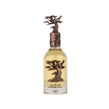 Lattafa Eternal Oud perfume bottle with bronze tree design and cap on white background