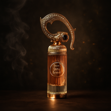 Lattafa Sehr perfume bottle with ornate golden handle on a dark smoky background