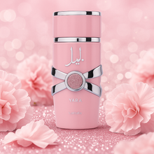 Lattafa Yara Eau de Parfum bottle with floral pink background and glitter, showcasing elegant feminine design