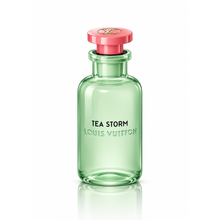 Louis Vuitton Tea Storm Eau de Parfum unisex fragrance bottle with translucent mint green glass, pink cap and gold LV logo on white background
