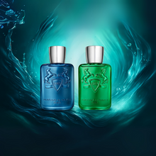 Two Parfums de Marly cologne bottles — Sedley and Greenley — displayed with a soft aqua background, perfect for a luxury summer fragrance sample pack.