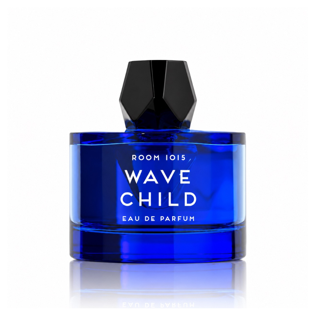 Room 1015 Wavechild Eau de Parfum unisex fragrance bottle featuring deep cobalt blue glass, white lettering and a faceted black cap on a white background
