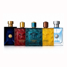Versace Discovery Set featuring Eros Eau de Parfum, Eros Flame Eau de Parfum, Eros Energy Eau de Parfum, Dylan Blue, and Pour Homme on a clean white background