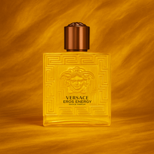Versace Eros Energy Eau de Parfum bottle displayed on vibrant gold background