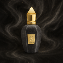 Luxury bottle of Xerjoff Ouverture perfume with gold cap and dark stone finish on an elegant black background