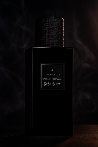 Yves Saint Laurent Le Vestiaire Des Parfums Couture Edition 6 Place Saint Sulpice bottle against a smoky dark backdrop, showcasing its luxurious black design.