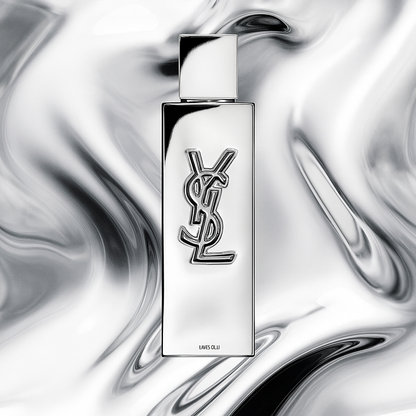 YSL Myslf L’Absolu Eau de Parfum bottle standing on chrome-textured background